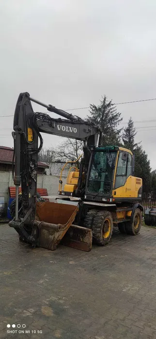 Usługi koparko-ładowarką Koparka kołowa z Głowicą Obrotowa Minikoparka