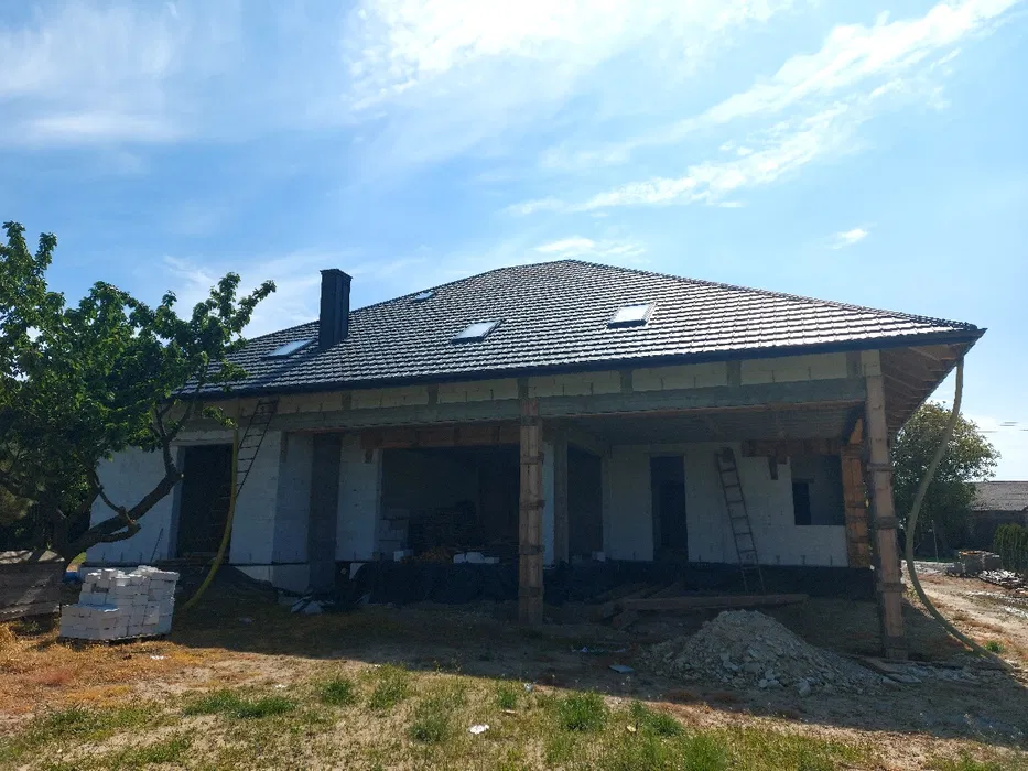 AM DACHY konstrukcje pokrycia dachowe okna dachowe
