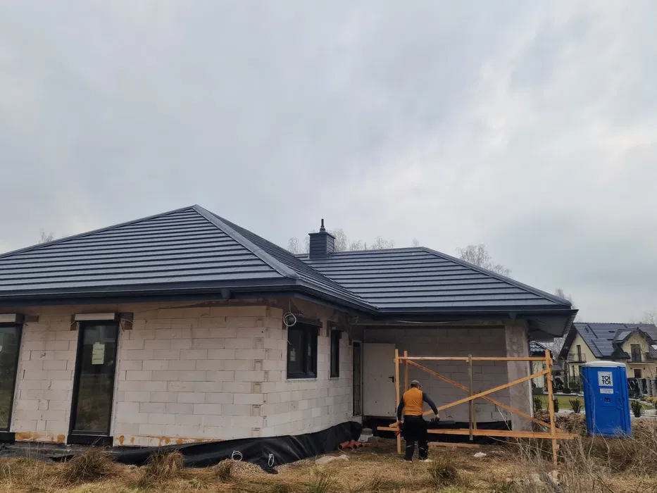 Dekarz, Reymont Dach