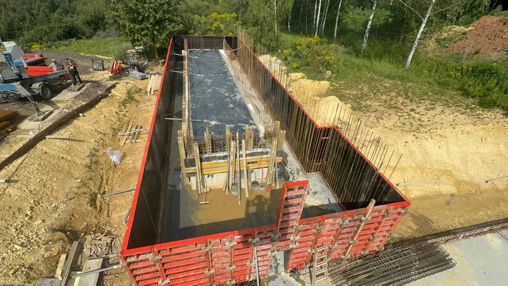 usługi budowlane budowa domów płyta fundamentowa usługi murarskie dom