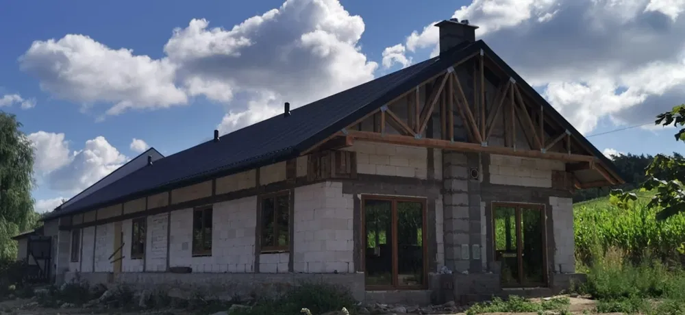 budowa domów pod klucz remonty adaptacje elewacje dachy ogrody koparka